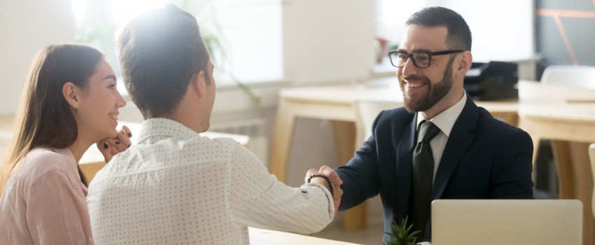 A couple meeting with a financial planner.